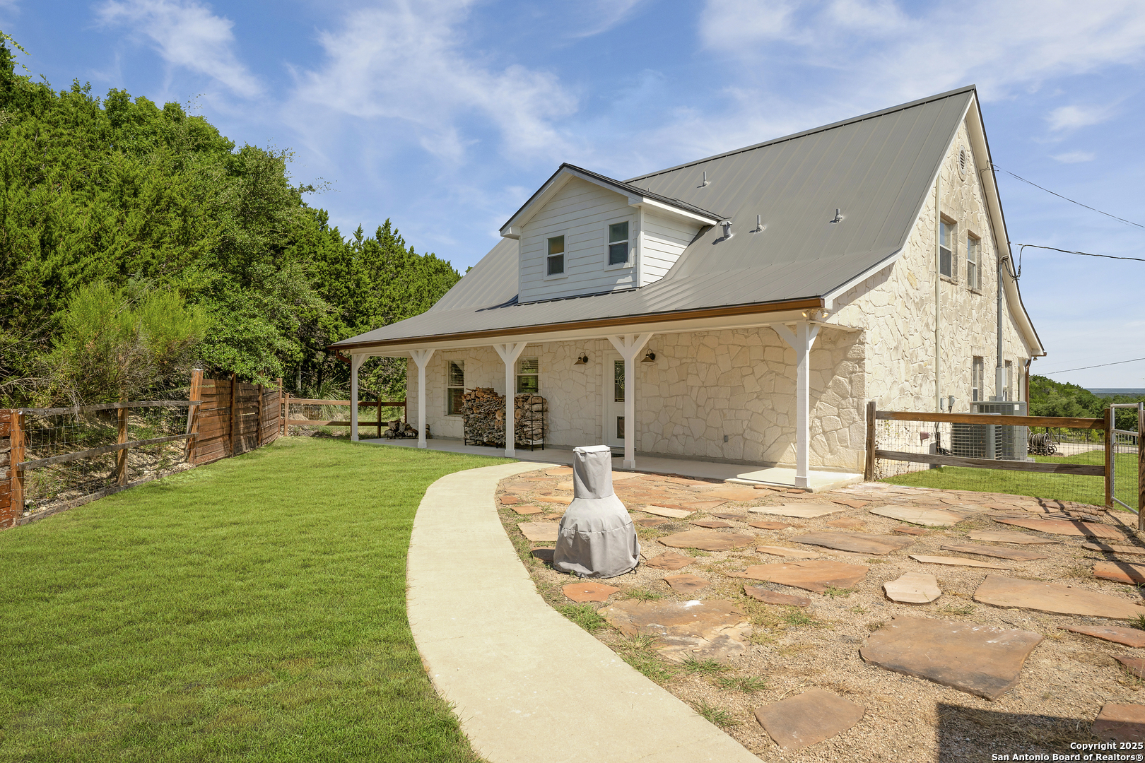 107 Ridge View Drive Boerne, TX 78006 - Photo 27 of 53 a view of a house with a backyard