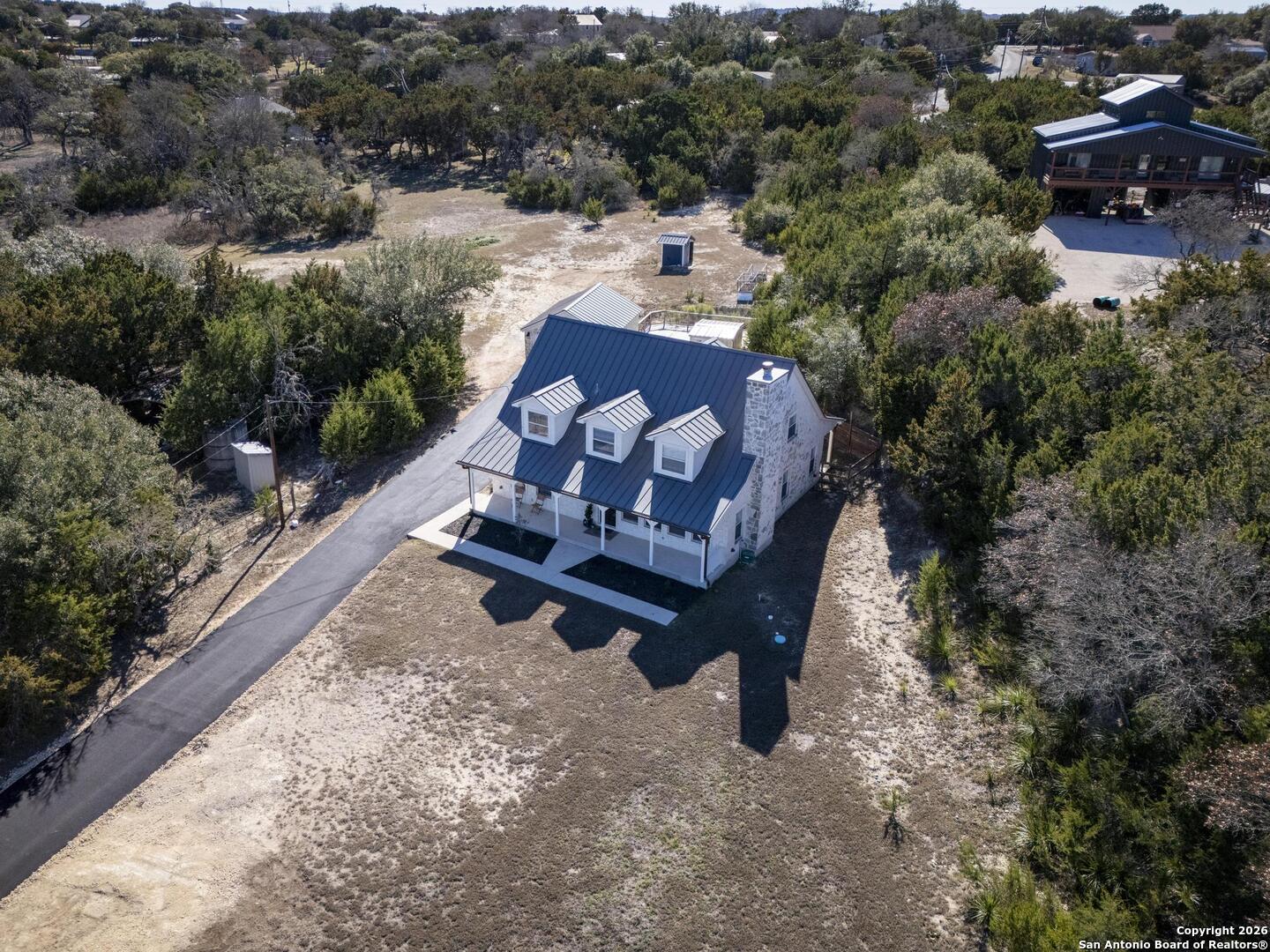 107 Ridge View Drive Boerne, TX 78006 - Photo 33 of 53 an aerial view of a backyard with outdoor seating