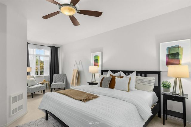 a view of a city with mountains in the background