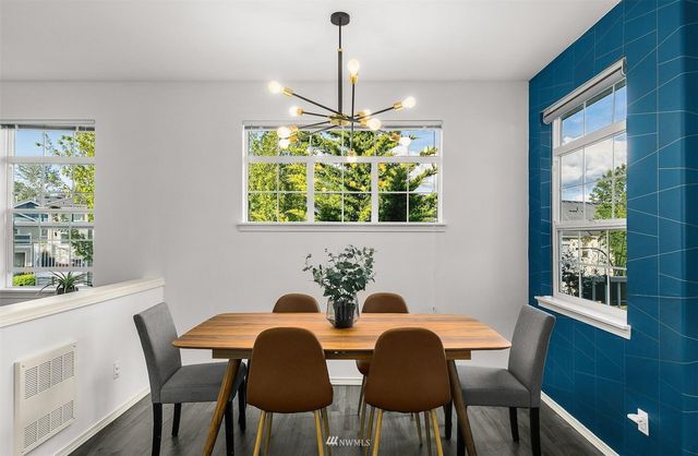 a view of a hallway with washer and dryer