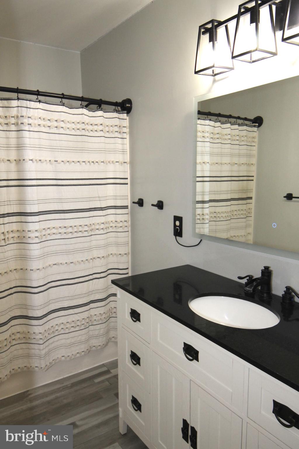 4695 Sands Road Harwood, MD 20776 - Photo 31 of 49 Main hallway bathroom newly remodeled