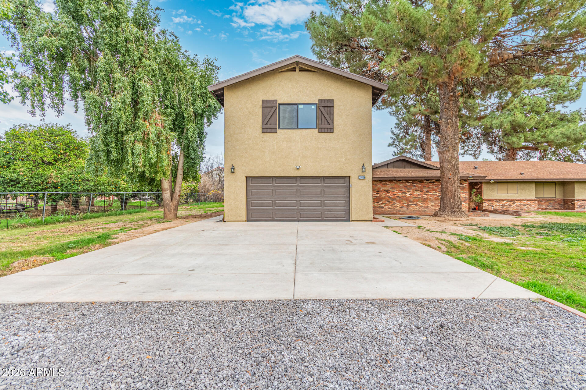21613 South 154th Street Gilbert, AZ 85298 - Photo 4 of 57 a front view of a house with a yard and garage
