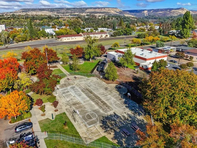 an aerial view of a city with lots of residential buildings