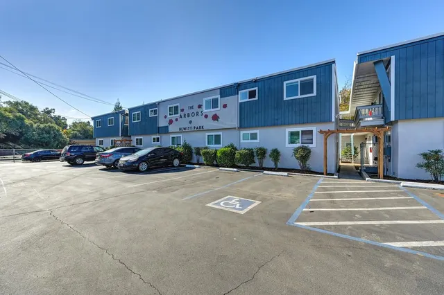a view of street with parked cars