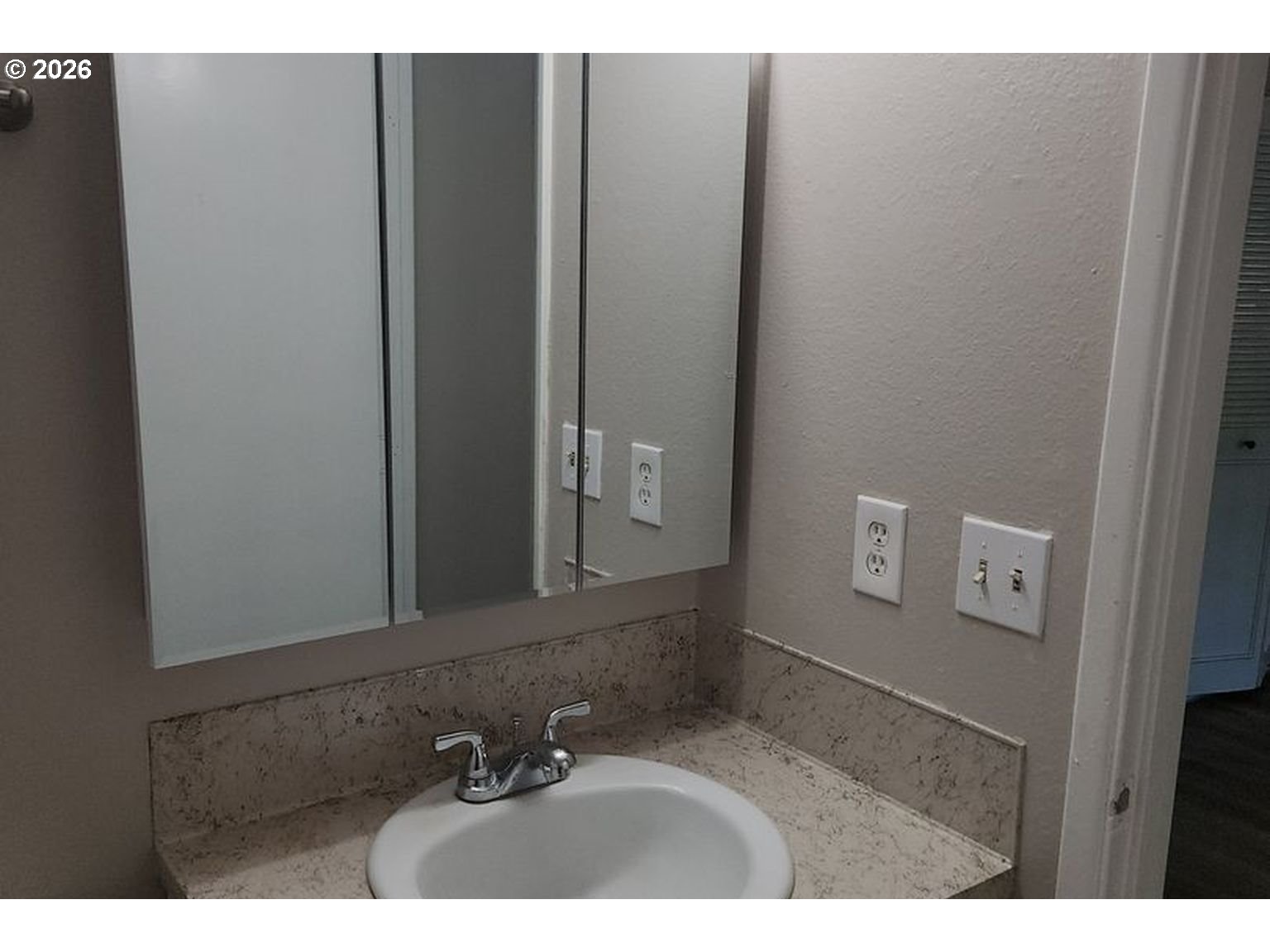 3124 19th Place Forest Grove, OR 97116 - Photo 5 of 31 a bathroom with a sink and a mirror