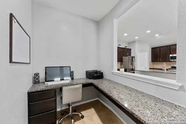 a room with a couch and a flat screen tv