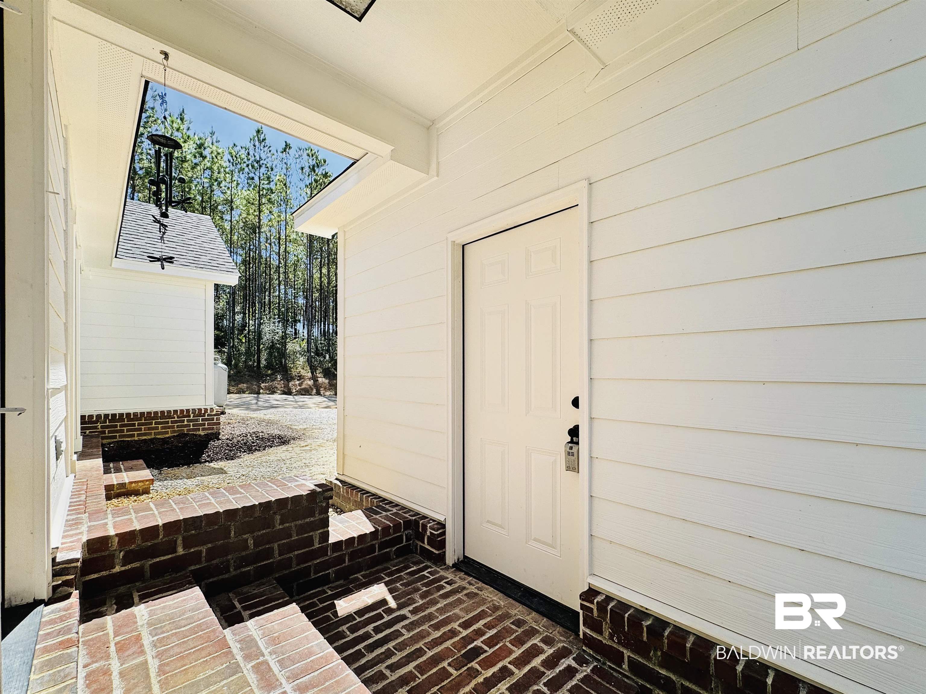 30687 Brady Road Robertsdale, AL 36567 - Photo 35 of 53 Breezeway off of the Laundry Room out to the Garage.