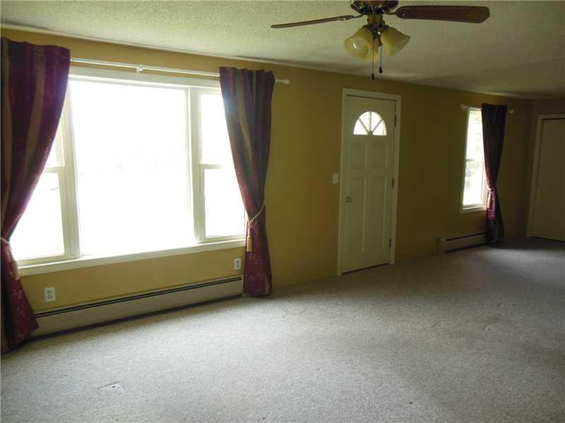 1779 Main Road Enfield, ME 04493 - Photo 5 of 13 Living Room.