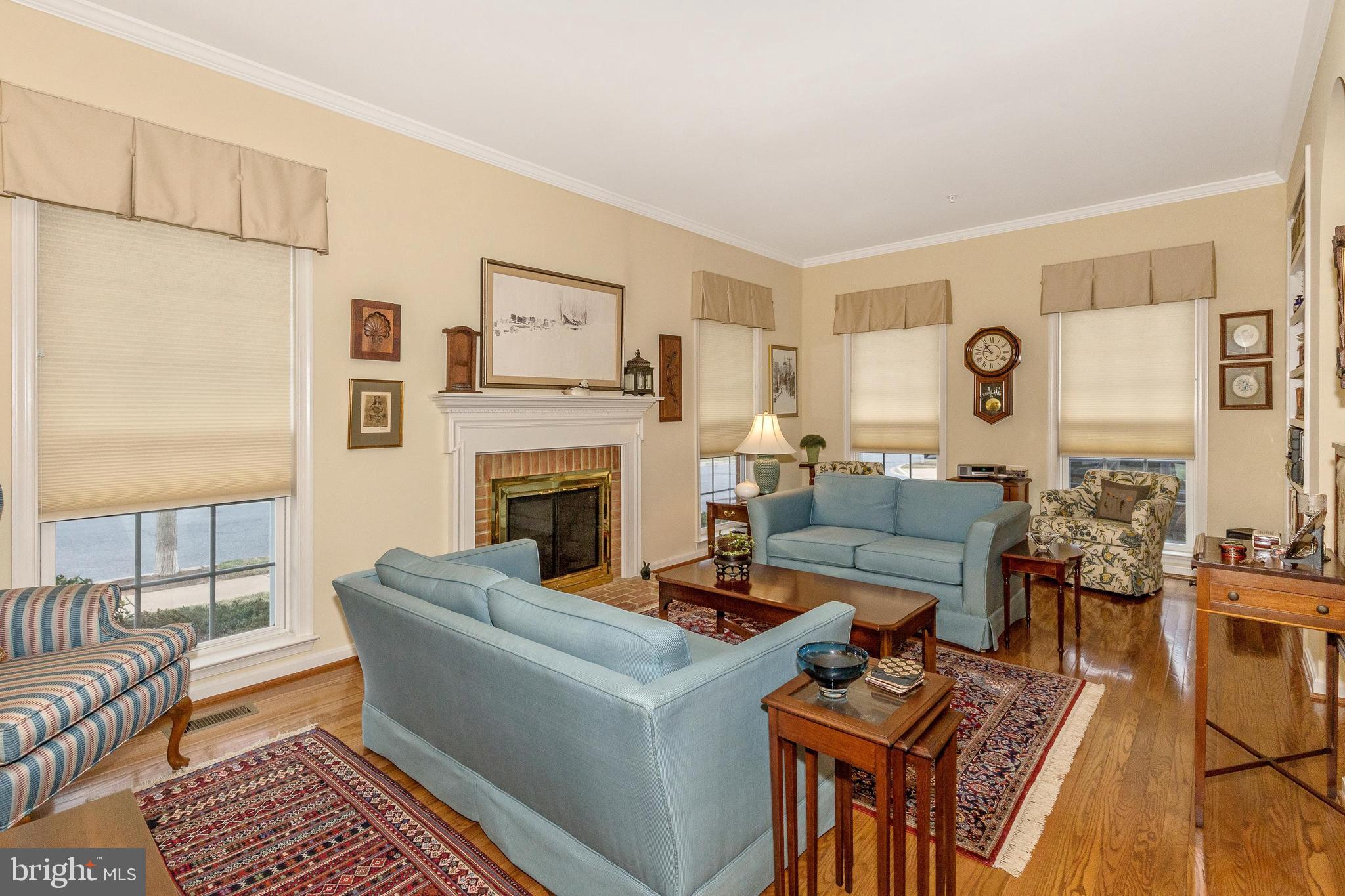 2618 Mill Race Road Frederick, MD 21701 - Photo 5 of 39 Family room has crown molding and hardwood floors