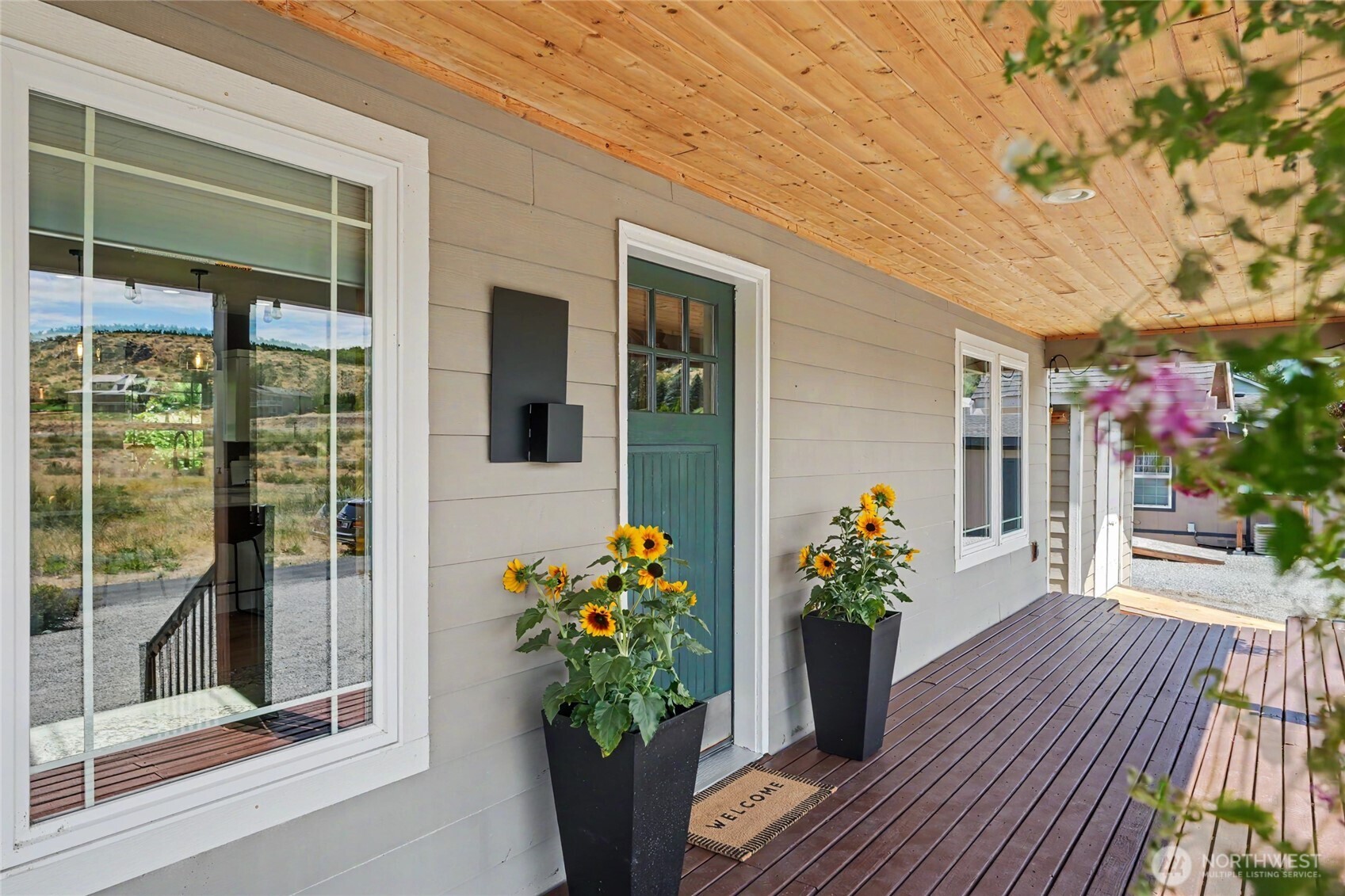 93 Golf Course Drive Pateros, WA 98846 - Photo 25 of 34 a front view of a house with a potted plant
