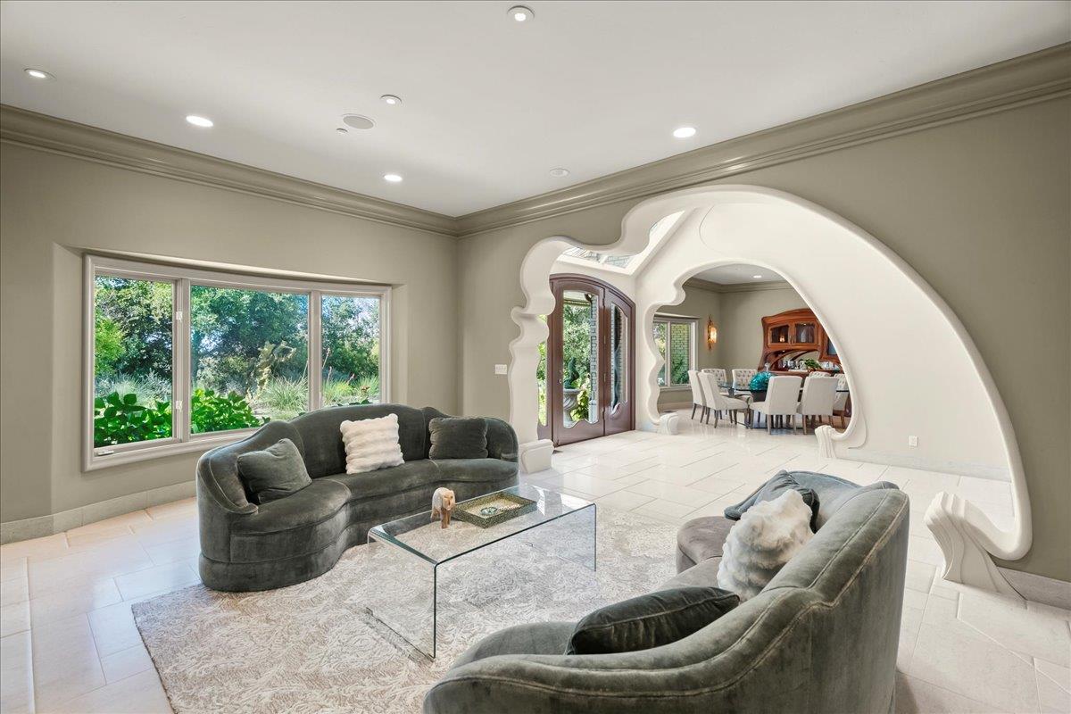 14467 Sobey Road Saratoga, CA 95070 - Photo 12 of 61 a living room with furniture and a large window