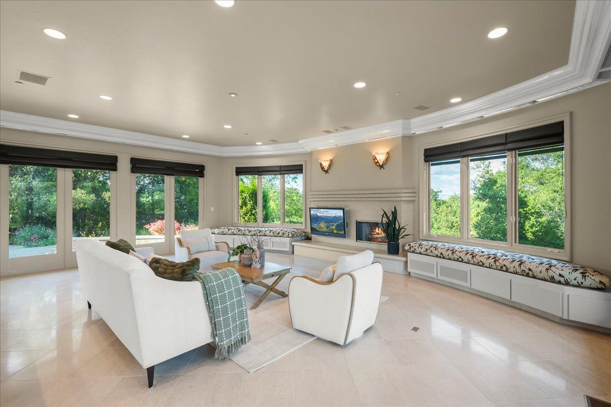 14467 Sobey Road Saratoga, CA 95070 - Photo 16 of 61 a living room with furniture and a large window