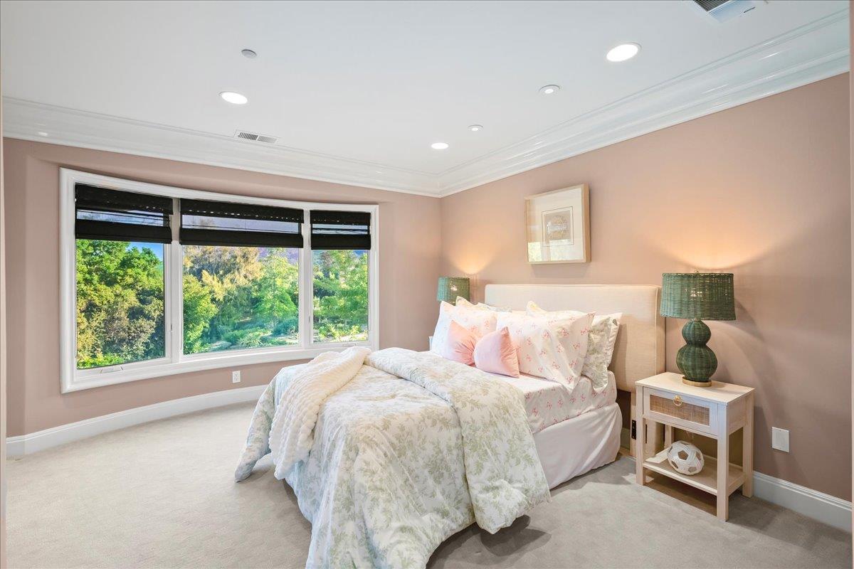 14467 Sobey Road Saratoga, CA 95070 - Photo 31 of 61 a bed room with a bed and a chair