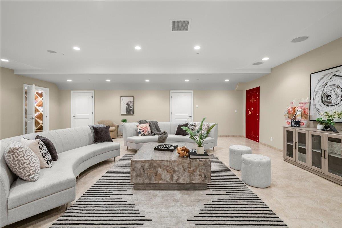 14467 Sobey Road Saratoga, CA 95070 - Photo 35 of 61 a living room with furniture and a rug