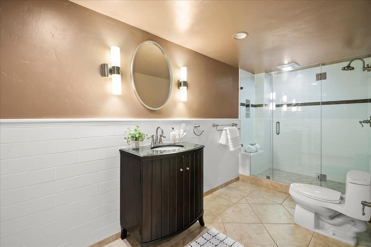 14467 Sobey Road Saratoga, CA 95070 - Photo 40 of 61 a bathroom with a sink and a mirror