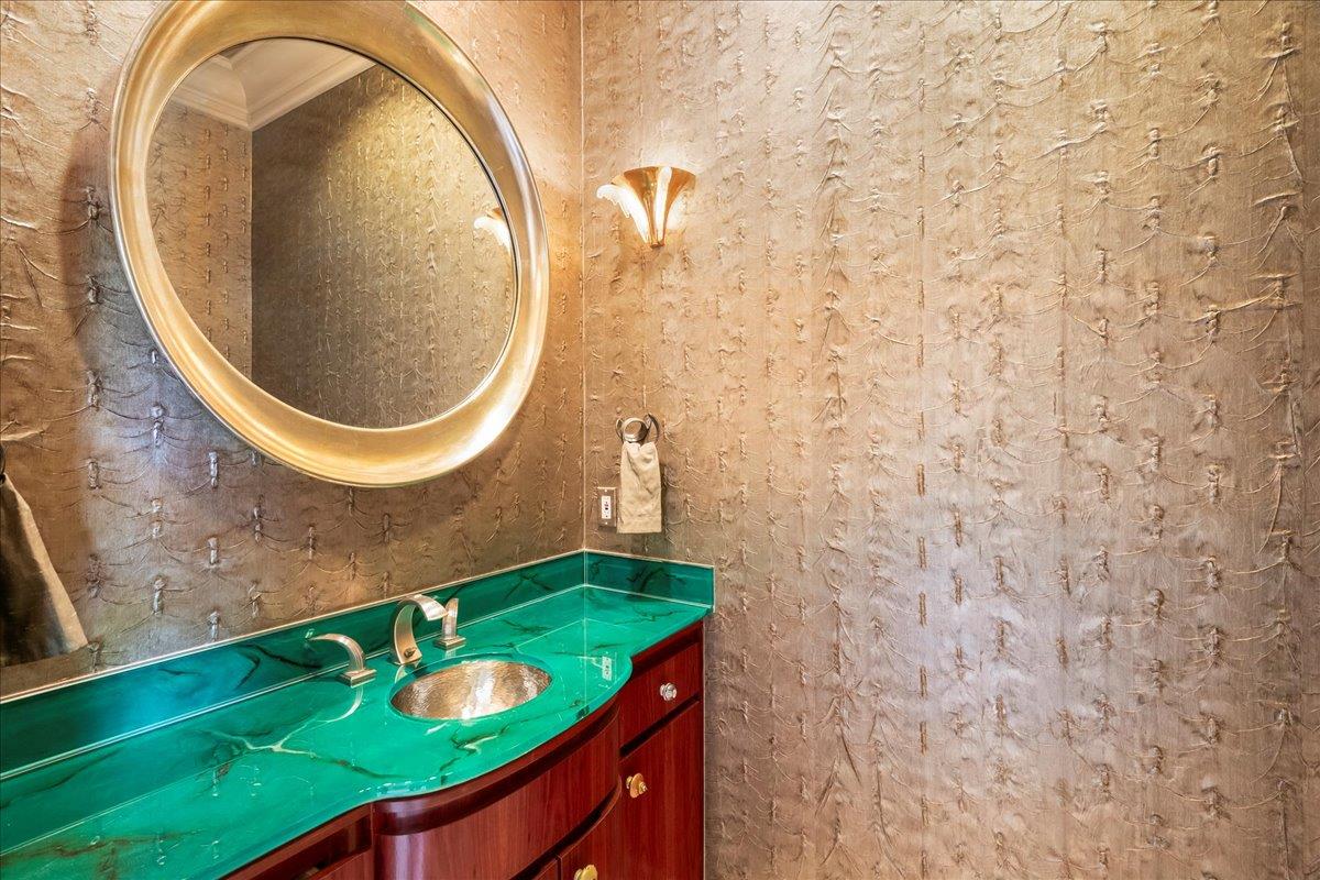 14467 Sobey Road Saratoga, CA 95070 - Photo 43 of 61 a bathroom with a sink and a mirror