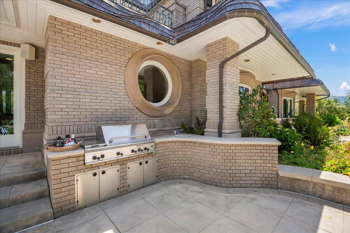 14467 Sobey Road Saratoga, CA 95070 - Photo 48 of 61 a spacious bathroom with a granite countertop sink a mirror and bathtub