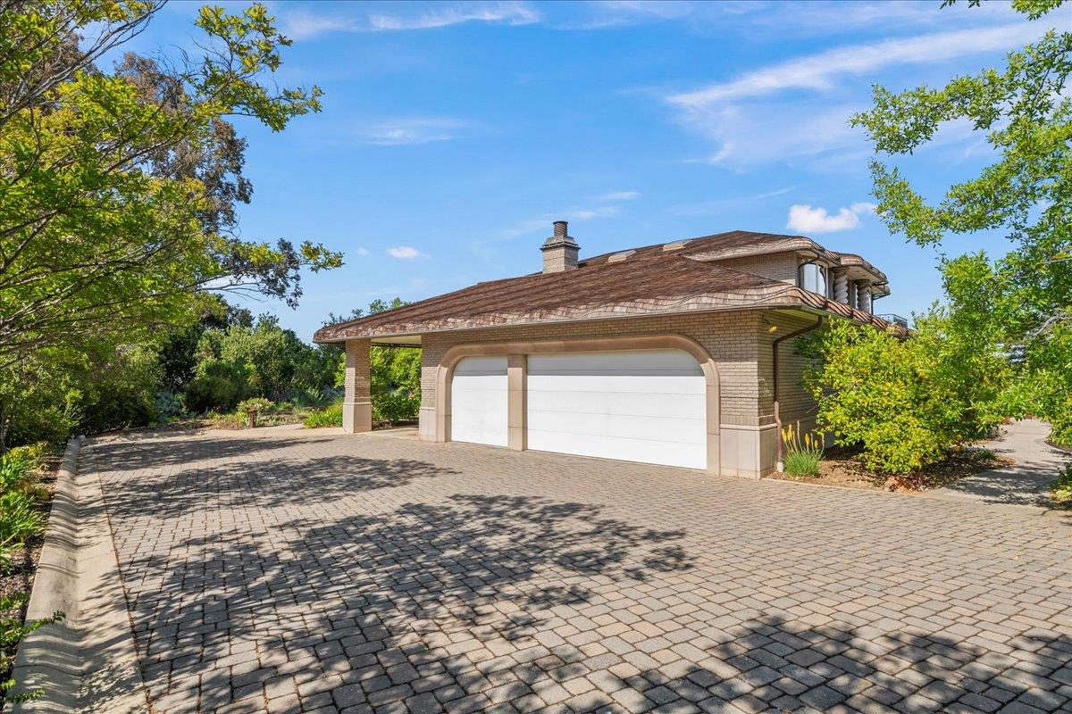 14467 Sobey Road Saratoga, CA 95070 - Photo 55 of 61 a front view of a house with a yard