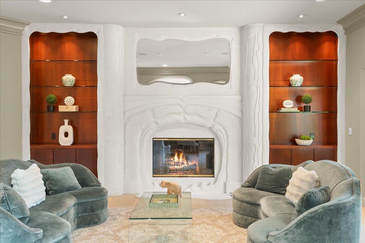 14467 Sobey Road Saratoga, CA 95070 - Photo 10 of 61 a living room with furniture and a fireplace