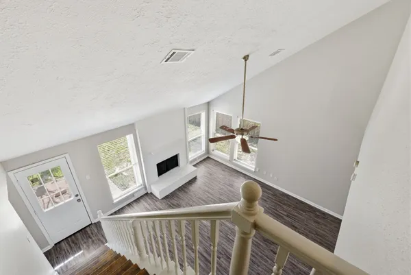 a view of a living room and hardwood floor