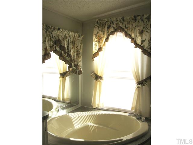 1601 Morgan Road Benson, NC 27504 - Photo 12 of 25 Nice garden tub to soak in after a long day!