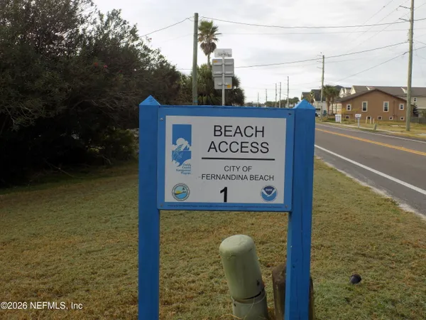a sign on the side of a road