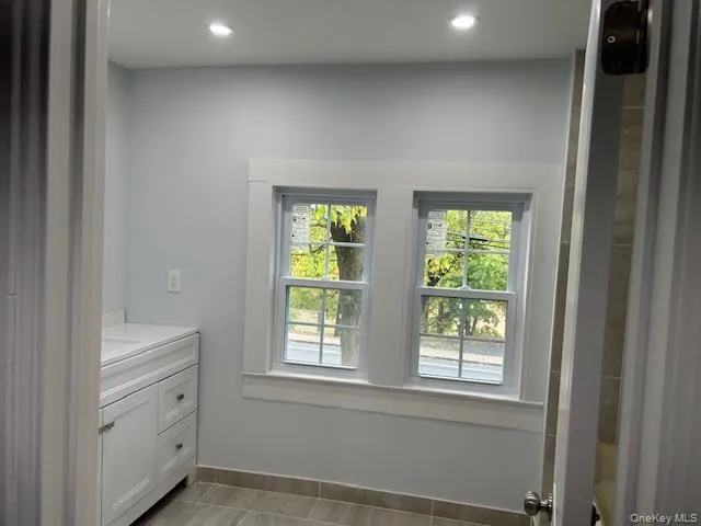 a room with windows and closet