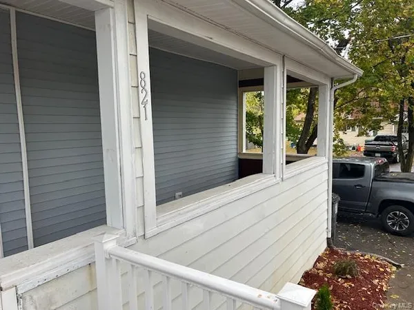 a view of a yard and street view