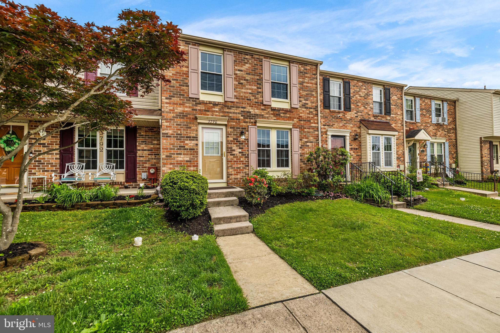 3790 Timahoe Circle Baltimore, MD 21236 - Photo 1 of 33 front view of a brick house with a yard