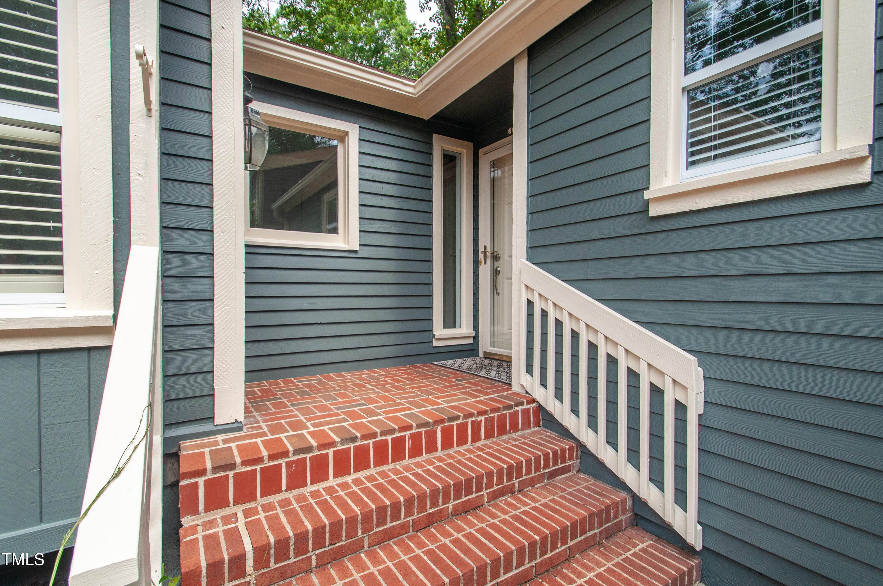 6044 Sentinel Drive Raleigh, NC 27609 - Photo 20 of 32 Front Entry
