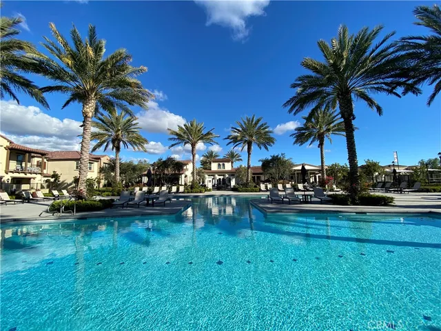 a house with palm tree in front of it