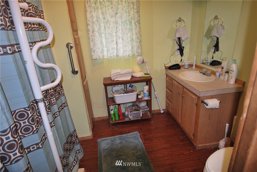 33330 Sultan Basin Road Sultan, WA 98294 - Photo 12 of 20 a view of an entryway with furniture and wooden floor