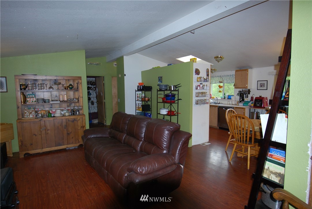 33330 Sultan Basin Road Sultan, WA 98294 - Photo 8 of 20 a living room with furniture and wooden floor