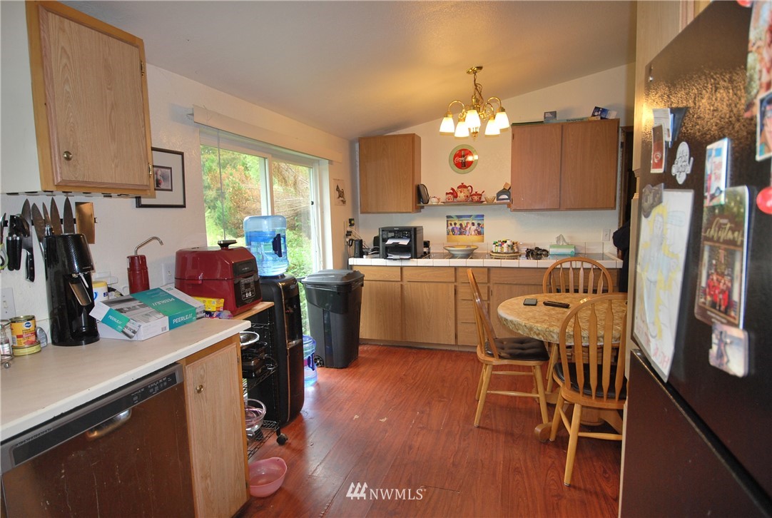33330 Sultan Basin Road Sultan, WA 98294 - Photo 10 of 20 a kitchen that has a cabinets counter space and appliances
