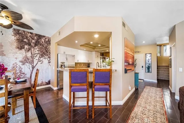 a view of a dining table with wooden floor