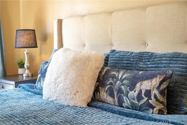 a bathroom with a toilet and a mirror