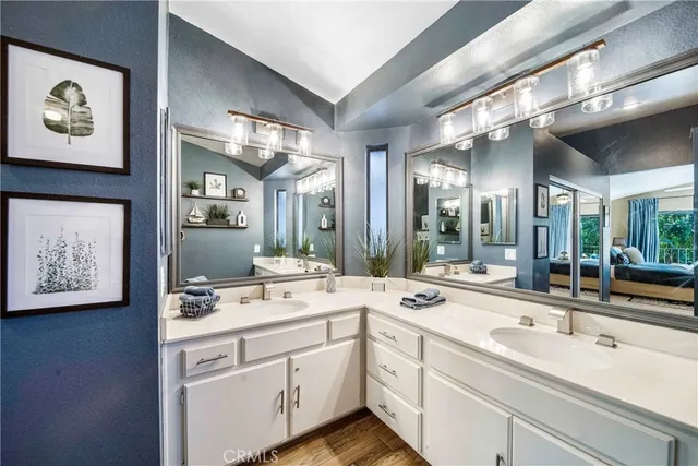 a view of a bed in a bedroom