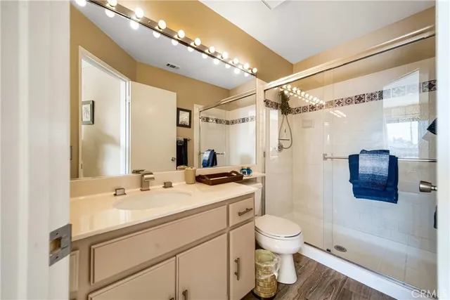 a balcony with furniture and a garden