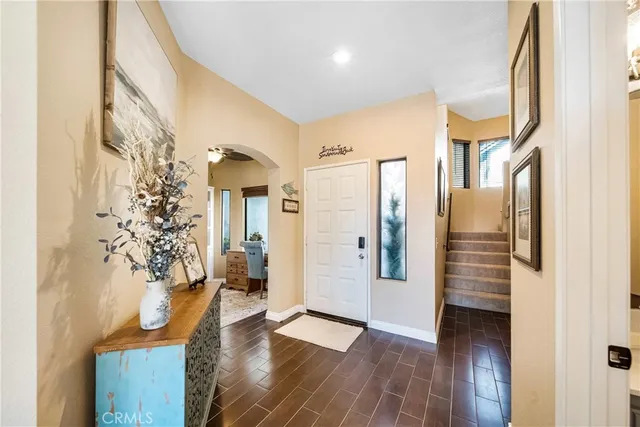 a view of entryway with wooden floor