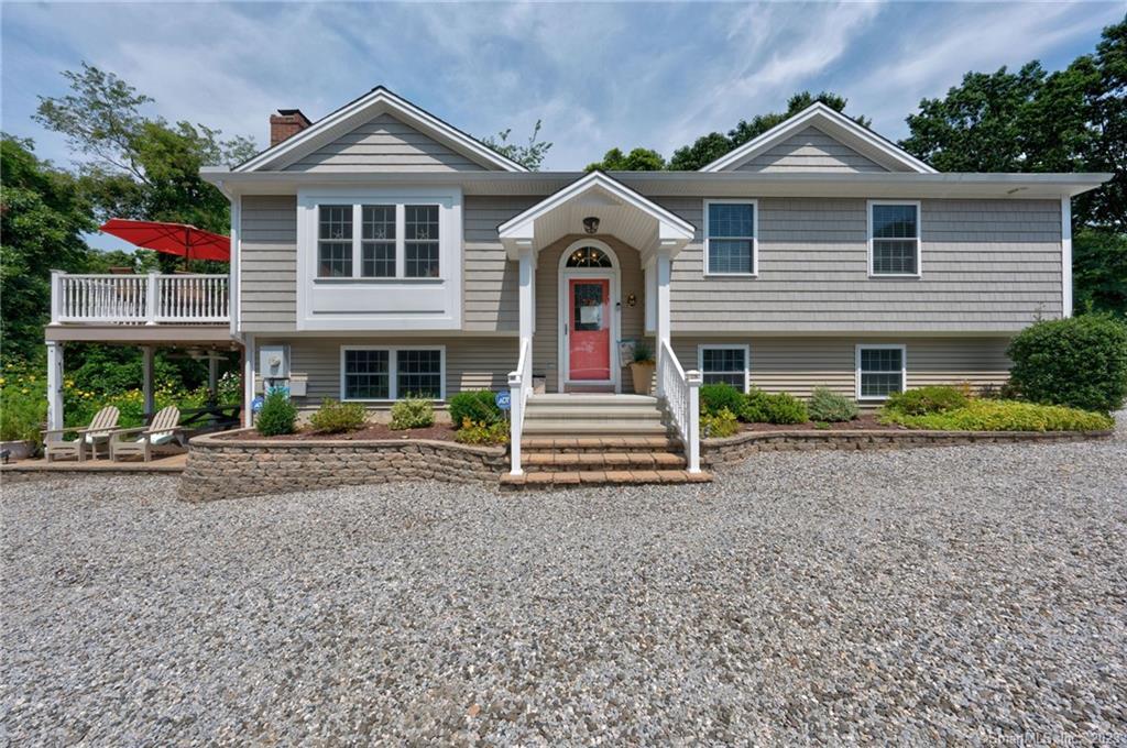 35 Griswold Road East Lyme, CT 06357 - Photo 1 of 1 a front view of a house with a yard