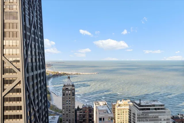 a view of a city with ocean view