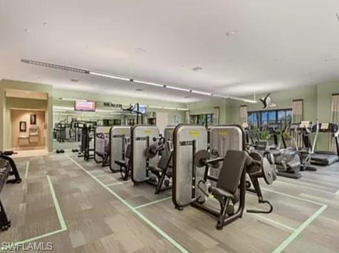 9397 Pocida Court, Unit 203 Naples, FL 34119 - Photo 13 of 32 a view of a room with gym equipment