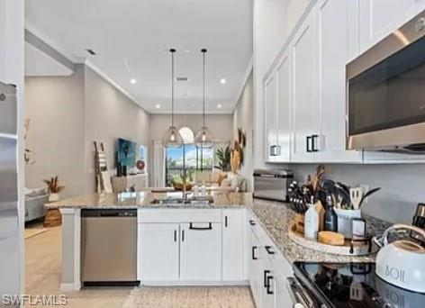9397 Pocida Court, Unit 203 Naples, FL 34119 - Photo 20 of 32 a kitchen with sink a stove and cabinets