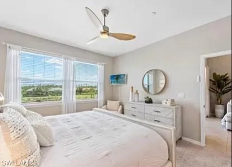 a bathroom with a granite countertop sink toilet a mirror and shower