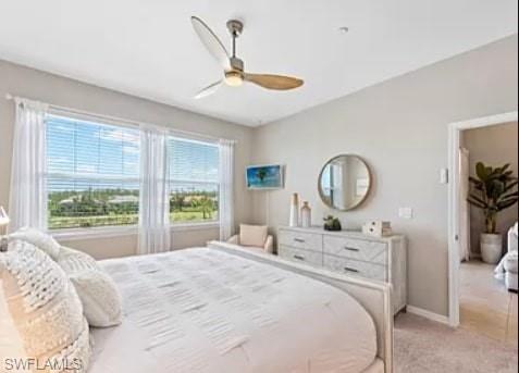 9397 Pocida Court, Unit 203 Naples, FL 34119 - Photo 28 of 32 a bedroom with a bed mirror and window