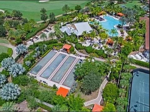 9397 Pocida Court, Unit 203 Naples, FL 34119 - Photo 4 of 32 an aerial view of residential houses with outdoor space