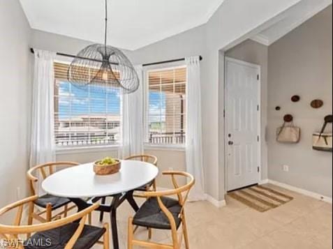 9397 Pocida Court, Unit 203 Naples, FL 34119 - Photo 7 of 32 a view of a dining room with furniture window and outside view