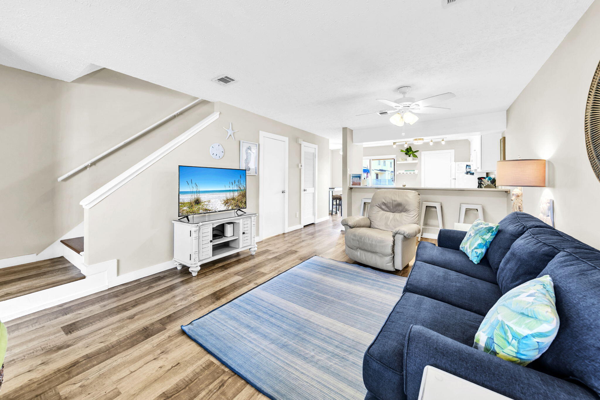 60 Sandprints Drive, Unit C12 Miramar Beach, FL 32550 - Photo 11 of 53 a living room with furniture and a wooden floor