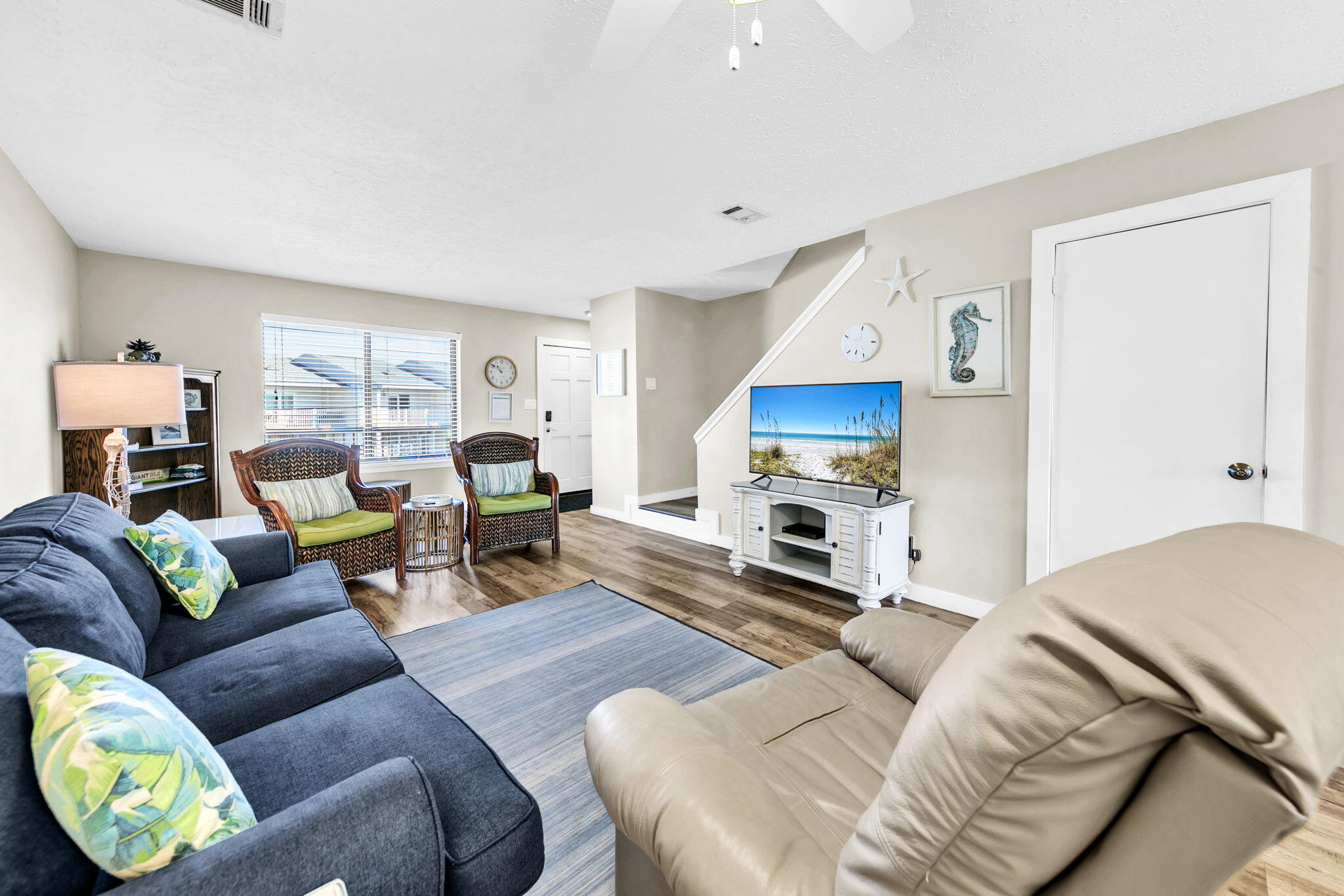 60 Sandprints Drive, Unit C12 Miramar Beach, FL 32550 - Photo 13 of 53 a living room with furniture a fireplace and a window
