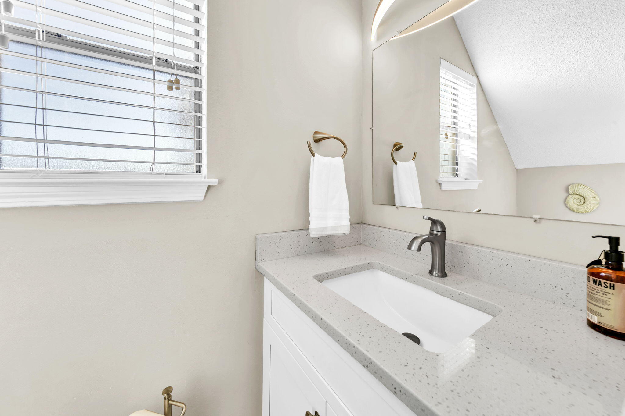 60 Sandprints Drive, Unit C12 Miramar Beach, FL 32550 - Photo 15 of 53 a bathroom with a sink and a mirror